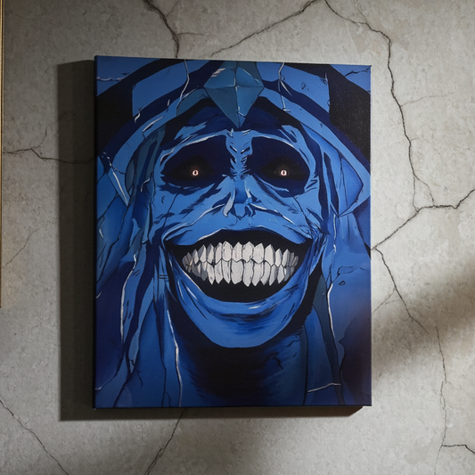 Blue and black abstract painting of a face on a textured wall with a candle and framed picture.