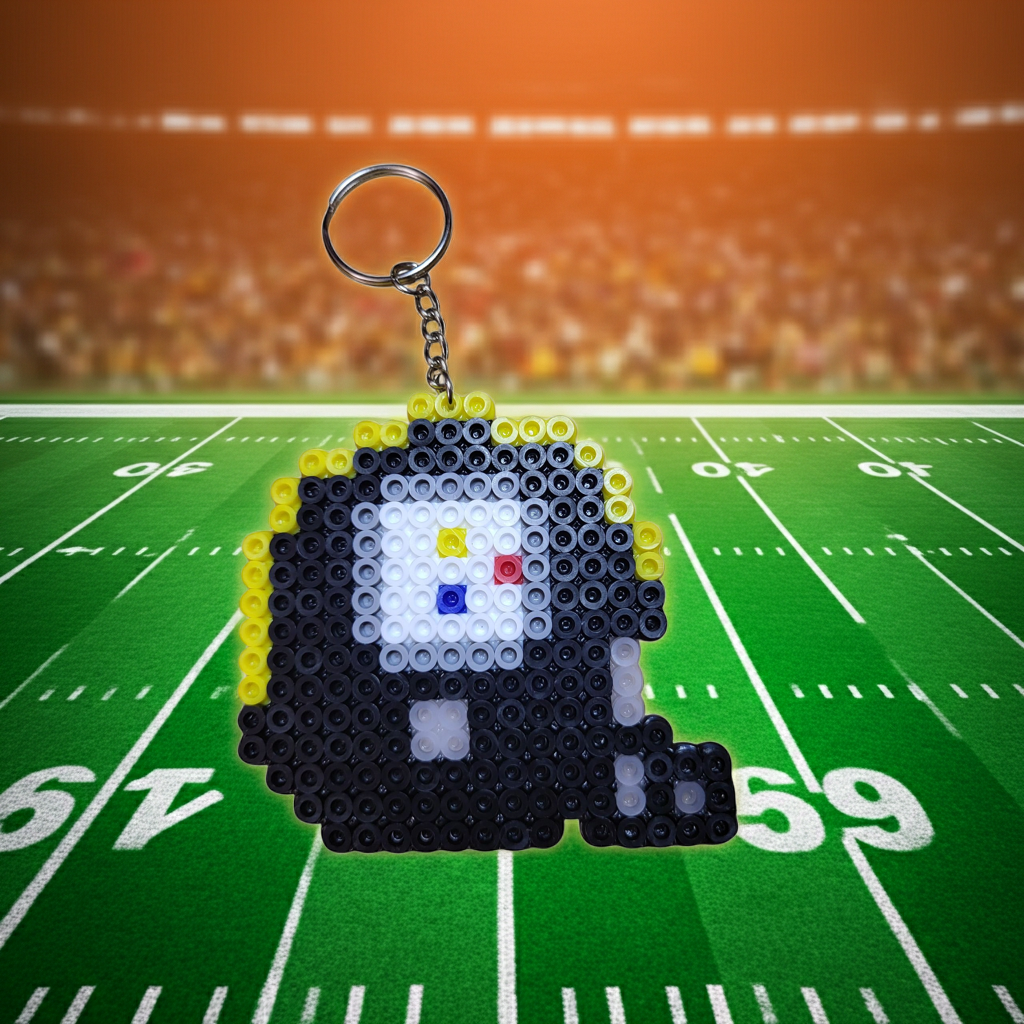 Pixelated keychain on a football field